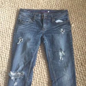 Dark blue ripped jeans